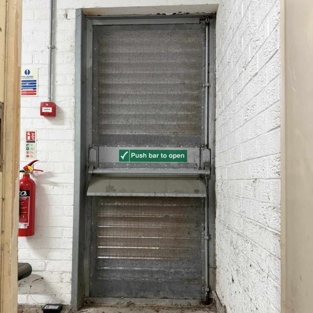 The interior of a slatted ventilation doors with a metal interior.